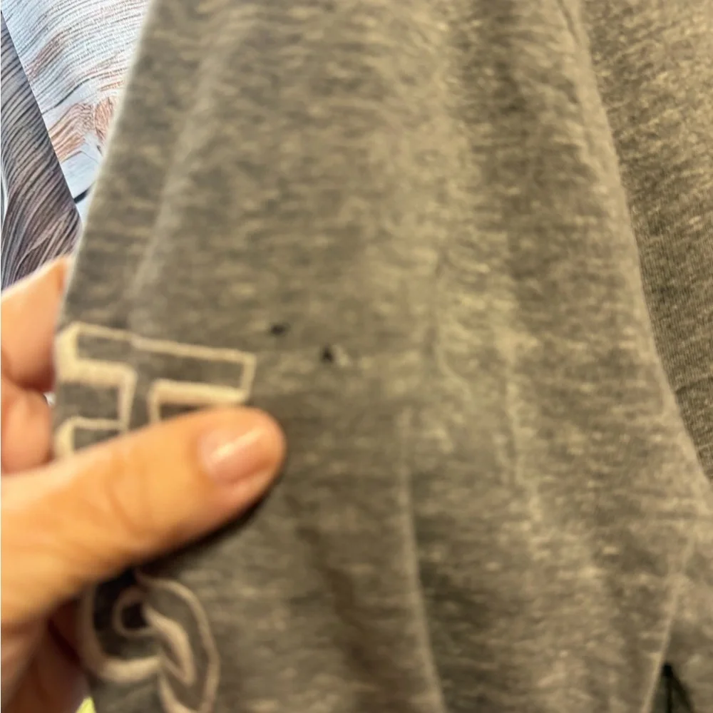 Hollister‎ Heather Gray long sleeve Tee. Two small holes in the sleeve.